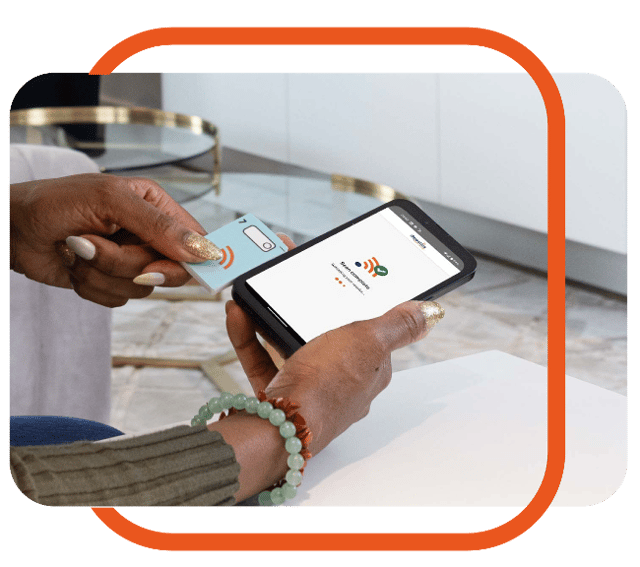 An image of a patient user scanning their test data snap-off fob to share their data with their care team via the GTT@home mobile application.